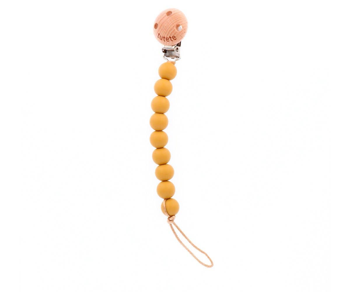 Attache-sucette en silicone antibactérien couleur moutarde pure