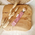 Attache tétine rose poudré en velours côtelé